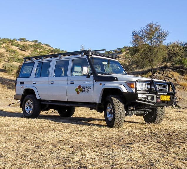 Group-5-V8-Toyota-Land-Cruiser-HJ76-streched-8-seater-without-camping-equipment-featured
