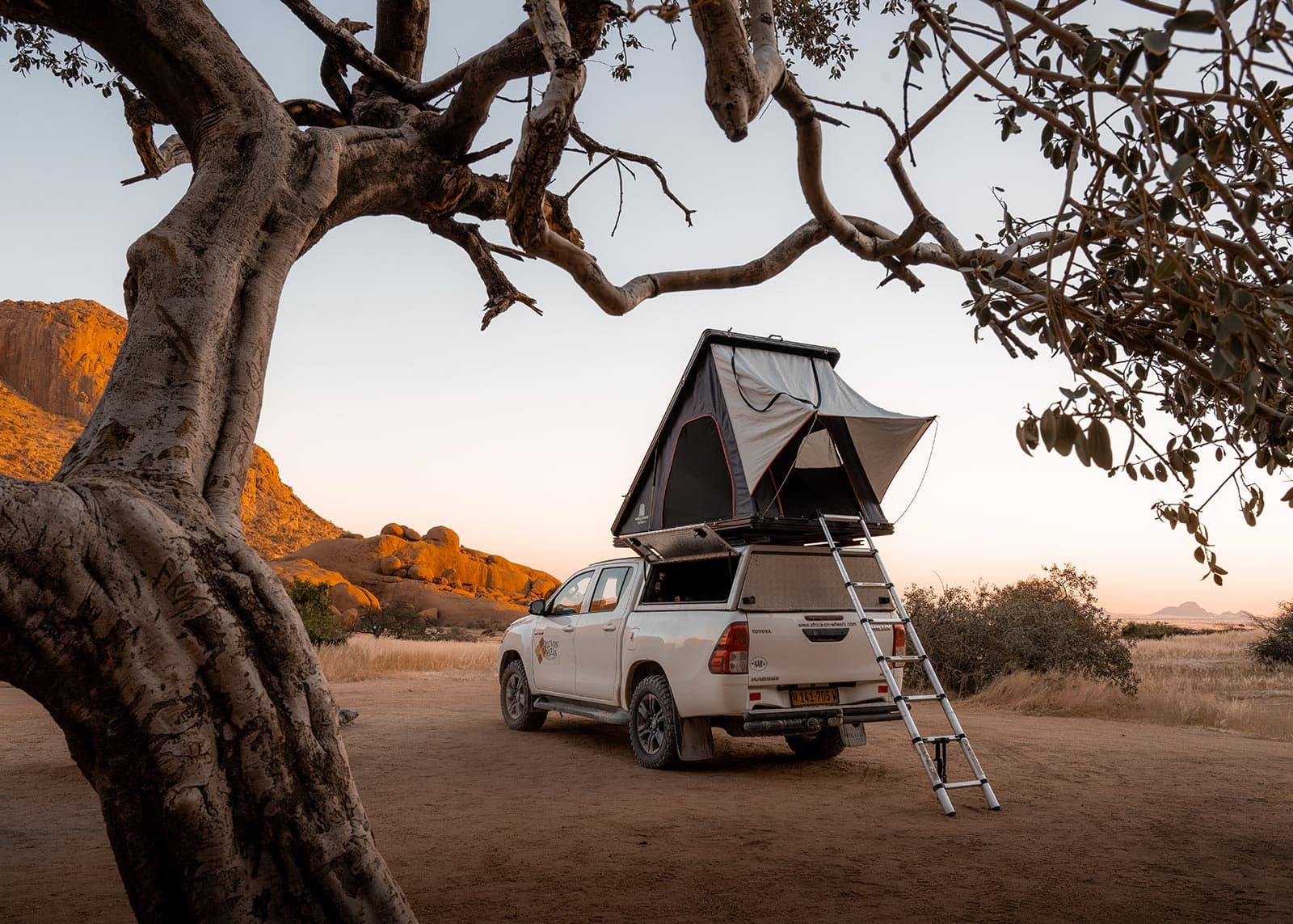 Group-7a-2.4-Toyota-Hilux-fully-equipped-for-two-persons-camping-with-extra-pop-up-tent
